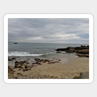 View from a sandy beach of a boat at sea Sticker